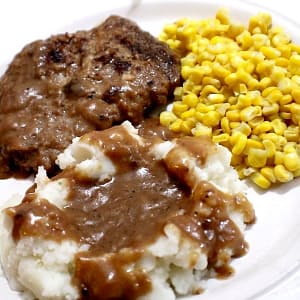 Cubed Steak Dinner with Mashed Potatoes and Corn